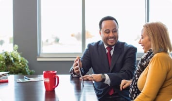 a man and a woman sitting at a table