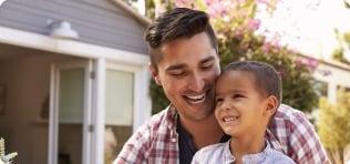 a person and a child smiling