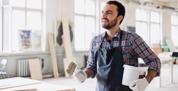 a man holding a coffee cup