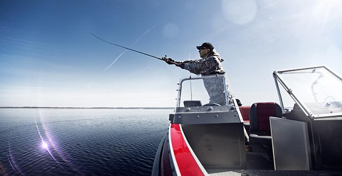 a man fishing on a boat