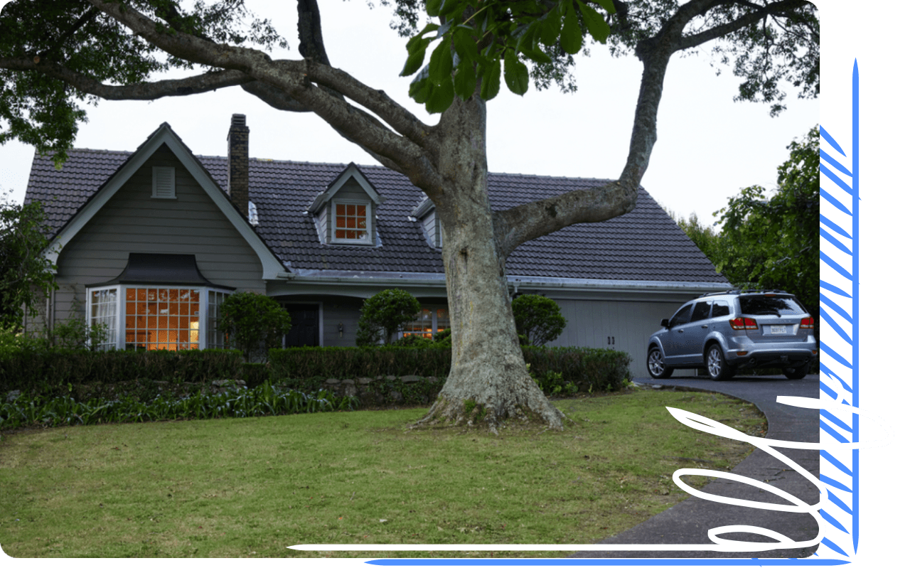 A single home with a car parked in the driveway