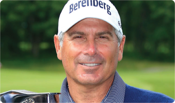 Fred Couples wearing a white hat